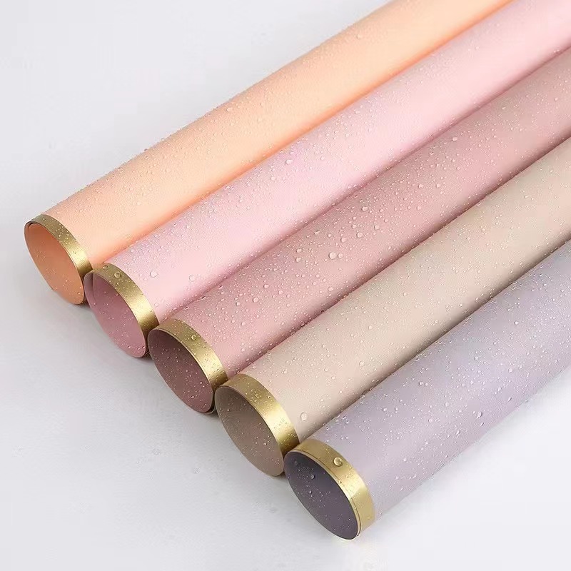 Papel de regalo de flores con película nacarada sólida con borde dorado MYHC-27