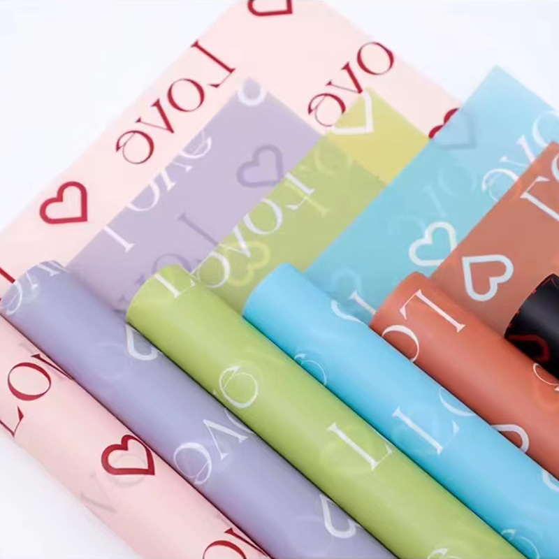 Papel Nossa para envolver flores con diseño de estampado de cartas de amor con revestimiento impermeable colorido