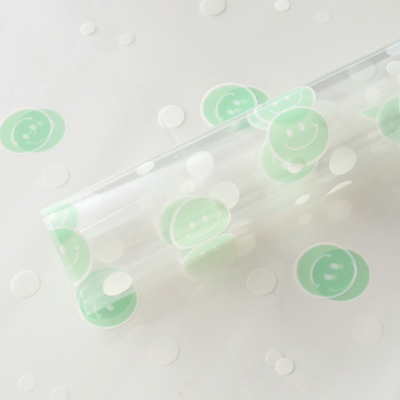 Papel de regalo de flores con cara sonriente de celofán OPP