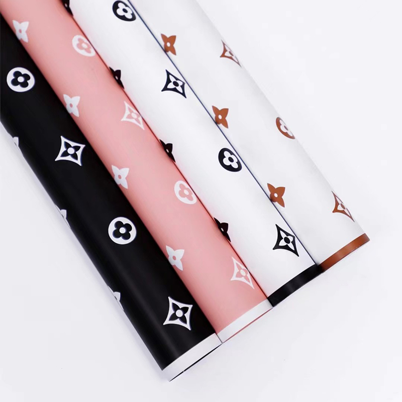 Papel de regalo marca Louis