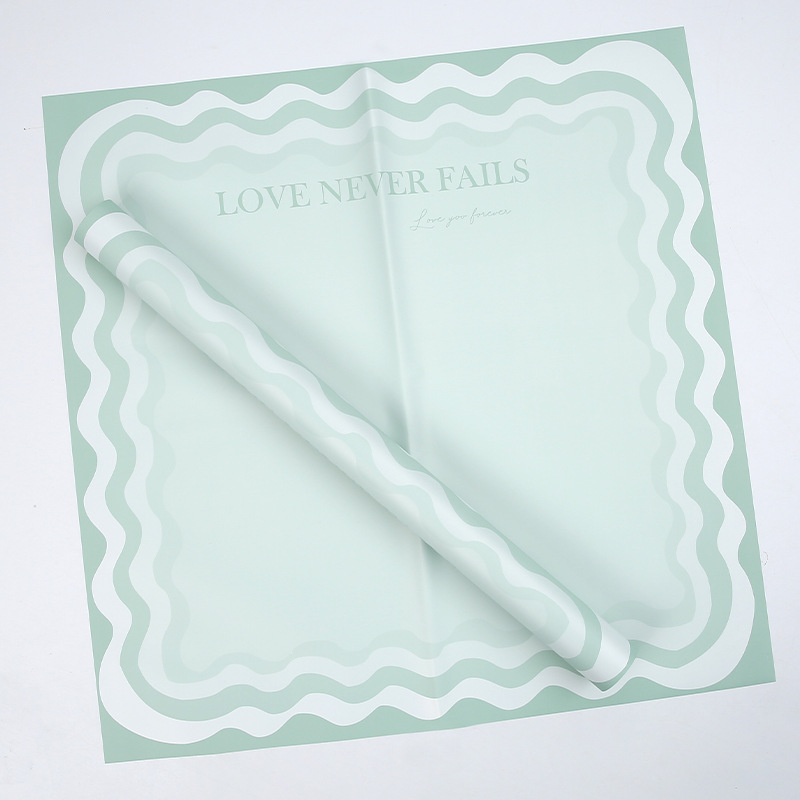 Papel de regalo de flores sólidas con borde ondulado