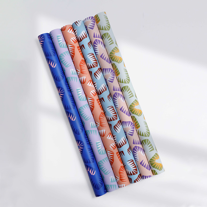 Seis papeles de regalo de flores con estampado de hojas de colores brillantes
