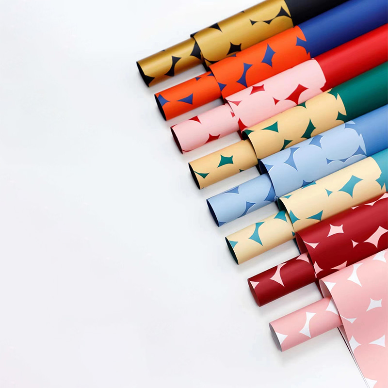 Papel de regalo de flores de lunares bicolor