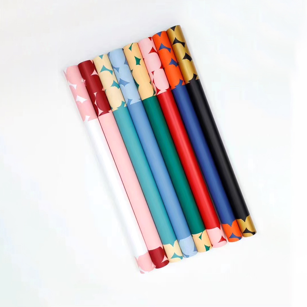 Papel de regalo de flores de lunares bicolor