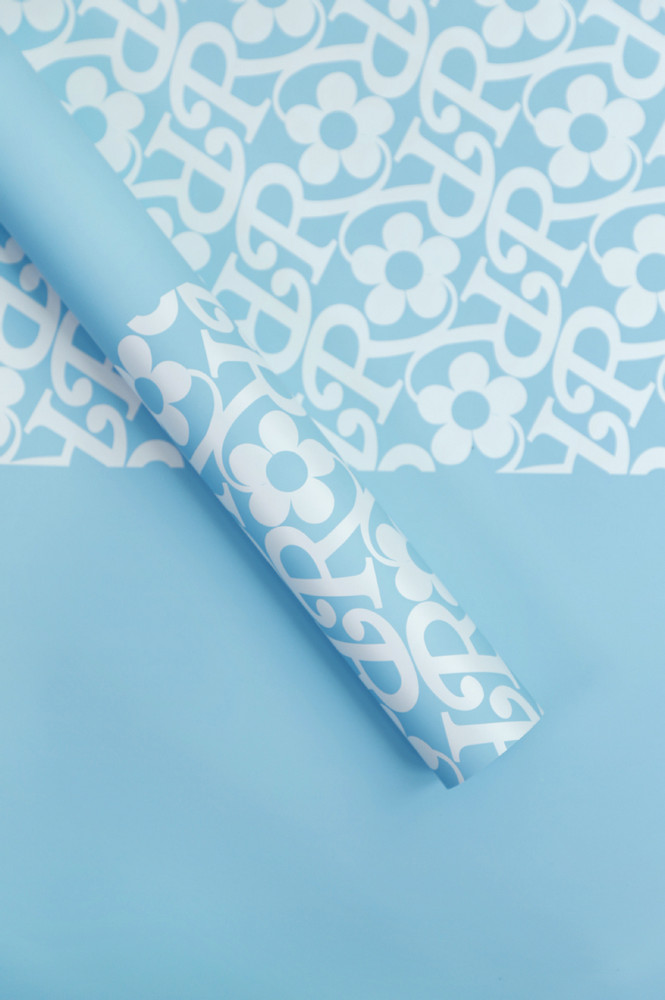 Papel de regalo de flores con estampado de flores de película mate