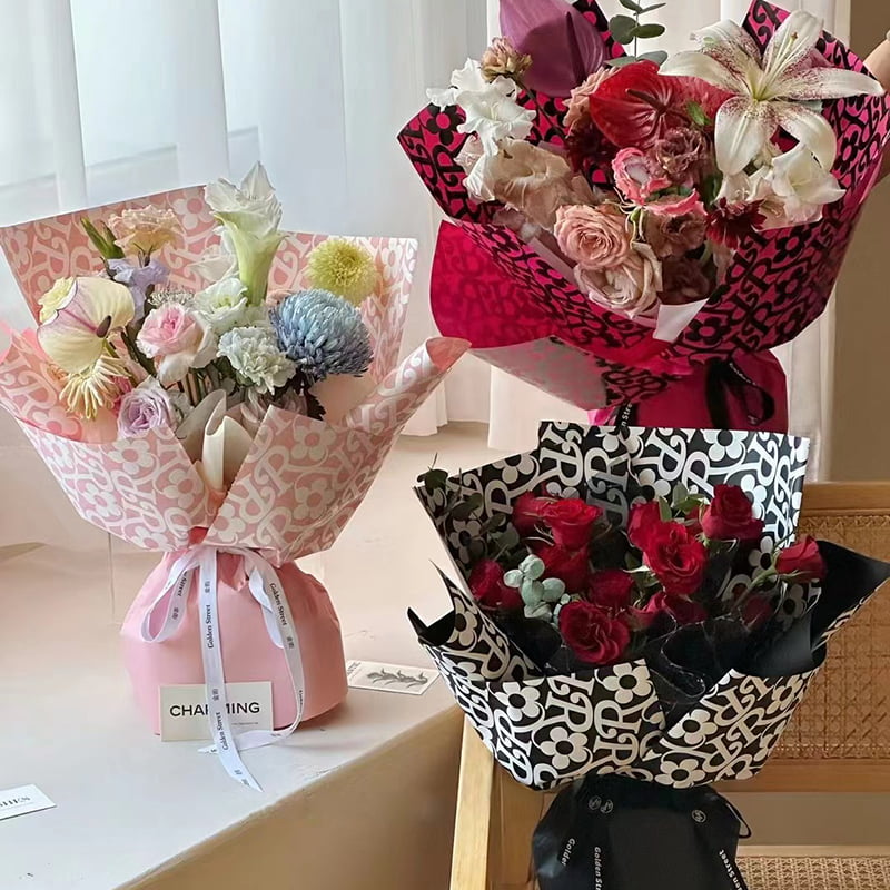 Papel de regalo de flores con estampado de flores de película mate