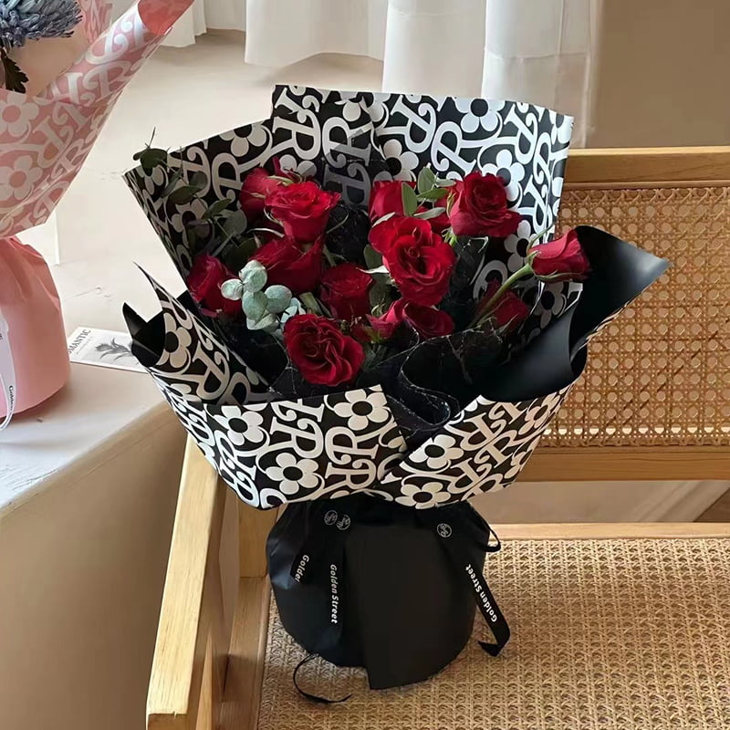 Papel de regalo de flores con estampado de flores de película mate