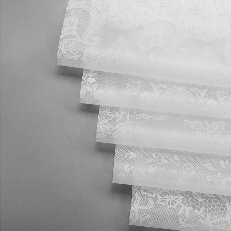 Papel de regalo de flores Nuosha en varios patrones y estilos.