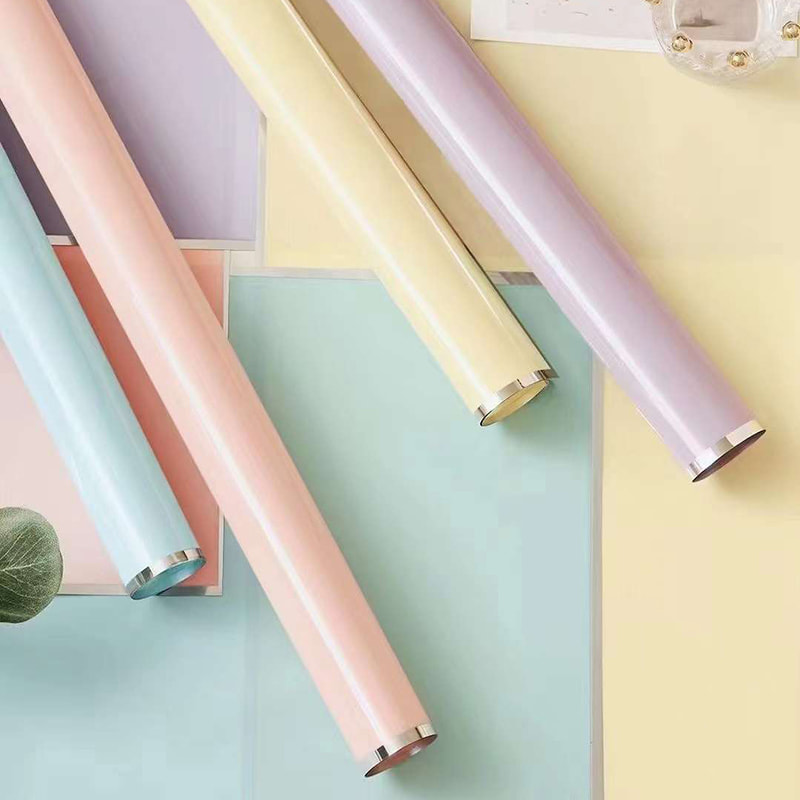 Papel de regalo de flores con película brillante al agua de iones de plata